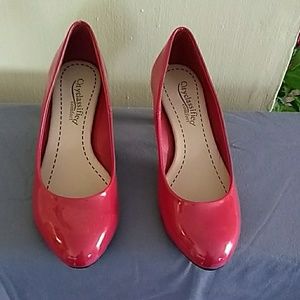 Red low heel pumps